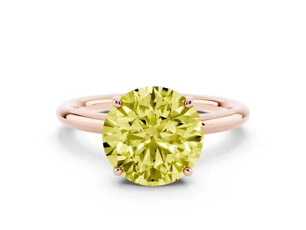 Fancy Yellow Round Cut Solitaire Diamond Ring with Four-Prong Setting on a Plain Band Rose gold