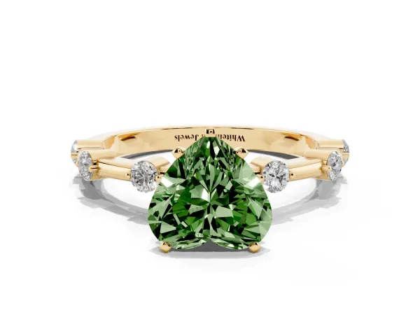 Fancy Green Heart Cut Solitaire Diamond Ring with Bezel Set Side Stones and Prong Setting Yellow gold