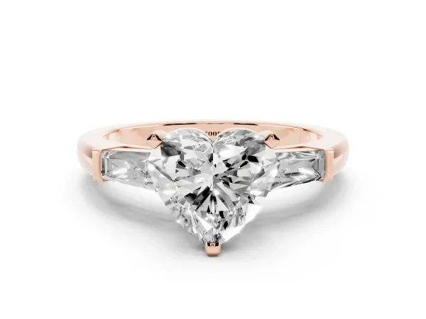 Heart Cut Solitaire with Tapered Baguette Side Stones on a Classic Band with Four-Prong Setting Rose gold