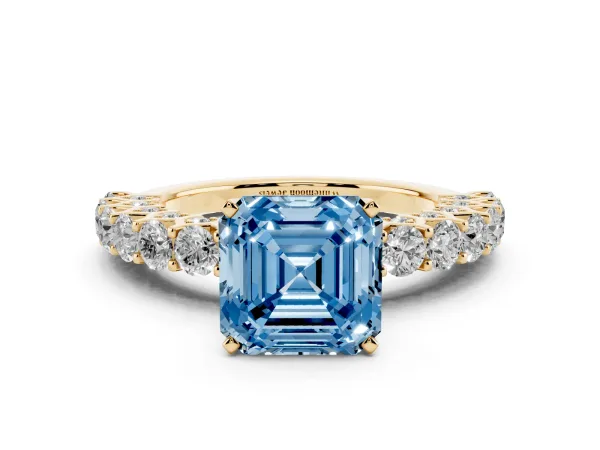 Fancy Blue Asscher Cut Diamond Solitaire Ring with Shared Prong Pavé Band and Four-Prong Setting Yellow gold