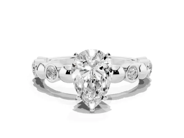 Pear Cut Solitaire Bezel-Set Diamond Ring with Beaded Band and Four-Prong Setting Platinum