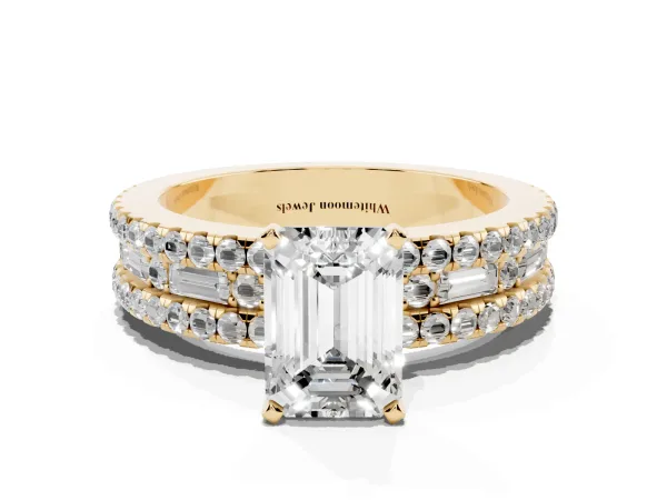 Emerald Cut Diamond Solitaire Ring with Pavé and Channel Set Band Yellow gold