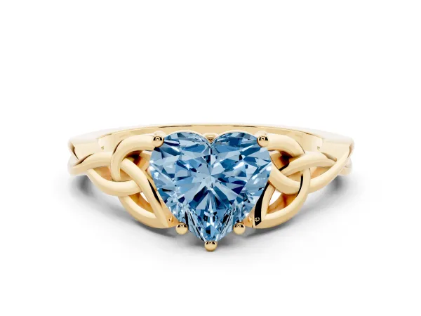 Fancy Blue Heart Cut Diamond Solitaire Engagement Ring with Celtic Knot Band and Four-Prong Setting Yellow gold