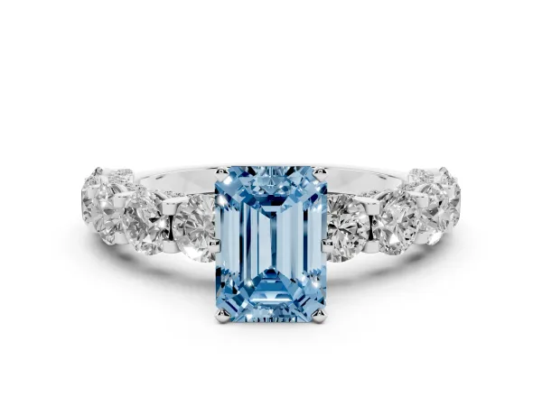 Fancy Blue Emerald Cut Diamond Side Stone Engagement Ring with Four-Prong Setting Platinum