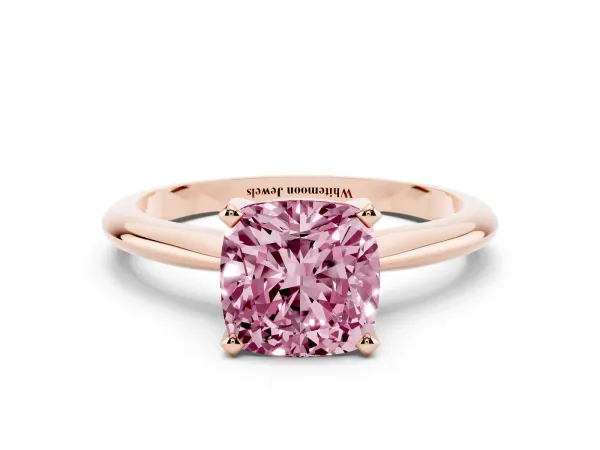 Fancy Pink Cushion Cut Cut Solitaire Ring with Four-Prong Setting on a Classic Band Rose gold