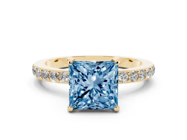 Fancy Blue Princess Cut Diamond Solitaire Engagement Ring with Pavé Band and Four-Prong Setting Yellow gold