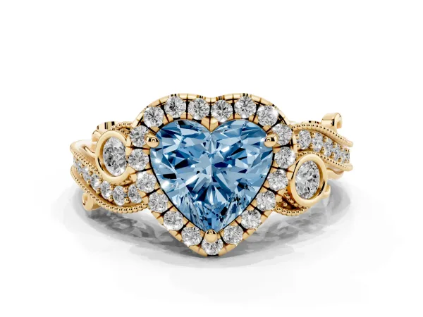 Fancy Blue Heart Cut Halo Diamond Ring with Milgrain and Bezel Accents on a Split Shank Band Yellow gold