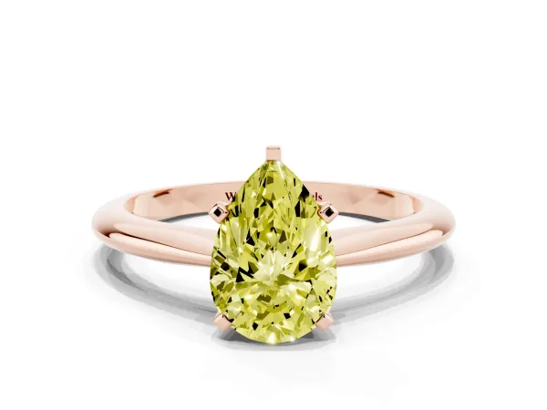 Fancy Yellow Pear Cut Cut Solitaire Ring with Four-Prong Setting on a Classic Band Rose gold