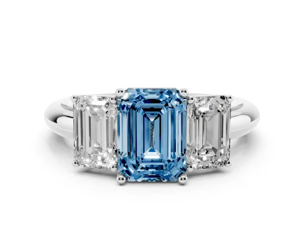Fancy Blue Three-Stone Emerald Cut Cut Diamond Engagement Ring with Prong Setting on a White Gold Band White gold