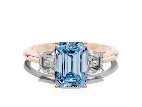 Fancy Blue Emerald Cut Diamond Three-Stone Ring with Trapezoid Side Stones and Prong Setting Rose gold