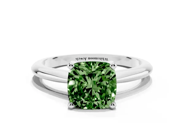 Fancy Green Cushion Cut Cut Solitaire Ring with Four-Prong Setting on a Classic Band Platinum
