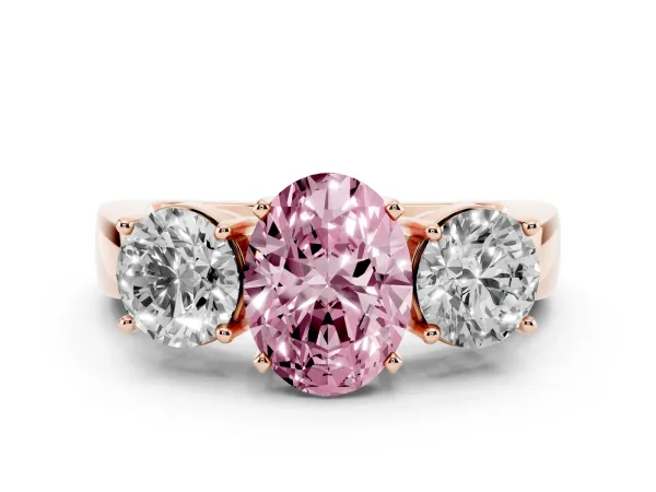 Fancy Pink Three-Stone Oval Cut Diamond Ring with Round Side Stones, Classic Band, and Four-Prong Setting Rose gold