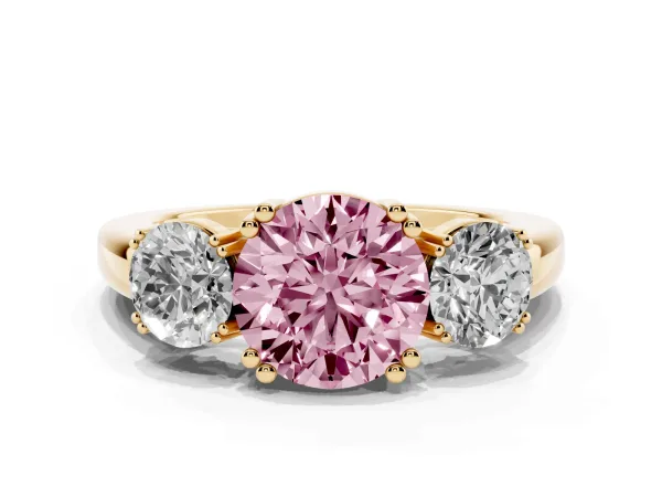 Fancy Pink Three-Stone Round Cut Cut Diamond Ring with Channel Set Band and Four-Prong Setting Yellow gold