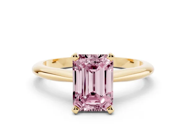 Fancy Pink Emerald Cut Cut Solitaire Ring with Four-Prong Setting on a Classic Band Yellow gold