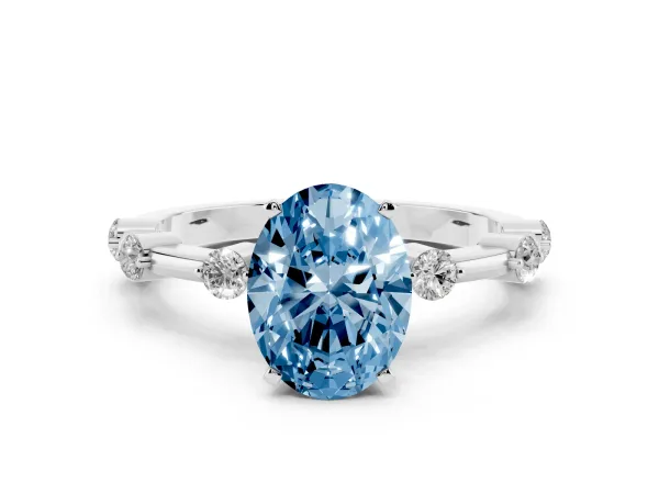 Fancy Blue Oval Cut Solitaire Diamond Ring with Bezel Set Side Stones and Prong Setting White gold