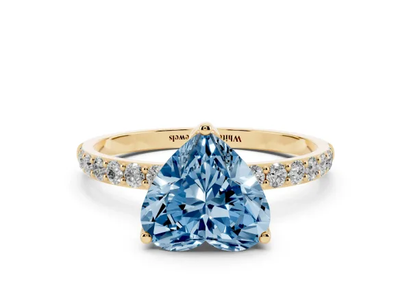 Fancy Blue Heart Cut Diamond Solitaire Engagement Ring with Round Pavé Band and Prong Setting Yellow gold