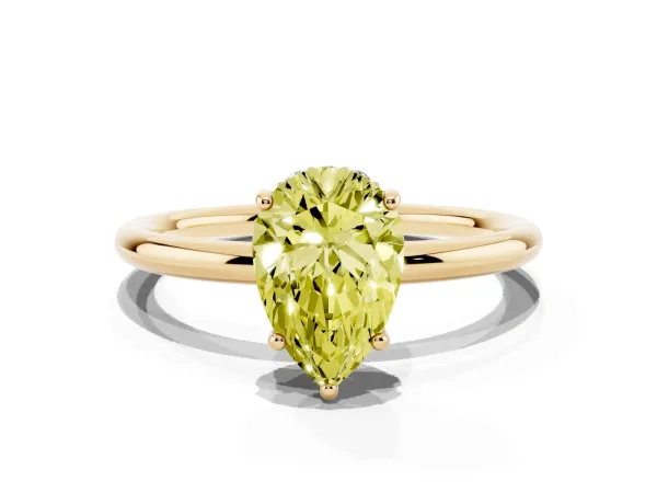 Fancy Yellow Pear Cut Solitaire Diamond Ring with a Classic Band and Four-Prong Setting Yellow gold