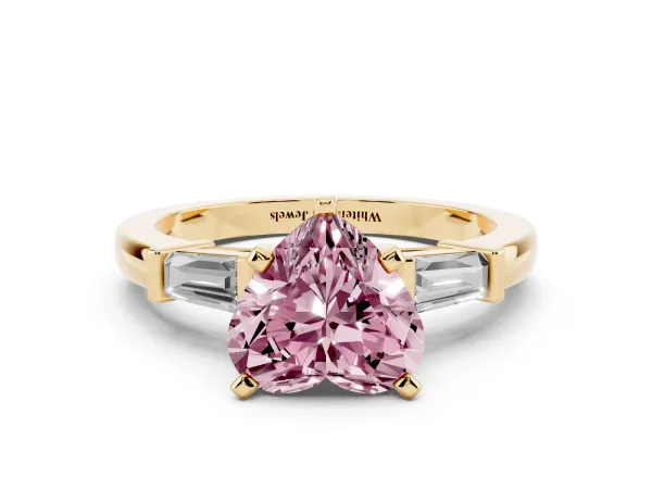 Fancy Pink Heart Cut Cut Diamond Solitaire Ring with Tapered Baguette Accents and Four-Prong Setting Yellow gold