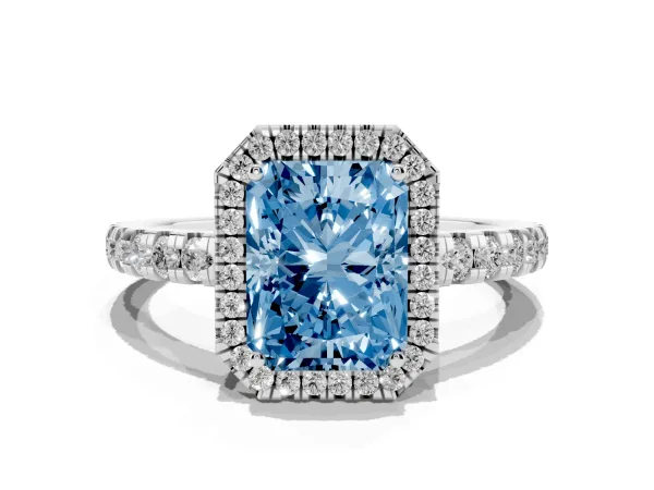 Fancy Blue Radiant Cut Diamond Halo Ring with Pavé Band and Four-Prong Setting Platinum