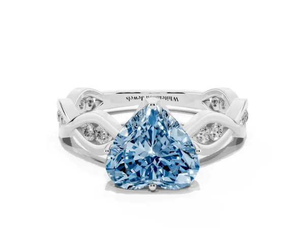 Fancy Blue Heart Cut Solitaire Twist Band with Leaf Prong Setting Platinum