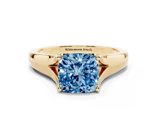 Fancy Blue Cushion Cut Solitaire Diamond Ring with Cathedral Band and Four-Prong Setting Yellow gold