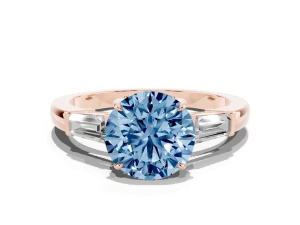 Fancy Blue Round Cut Diamond Three-Stone Ring with Tapered Baguette Side Stones and Prong Setting Rose gold