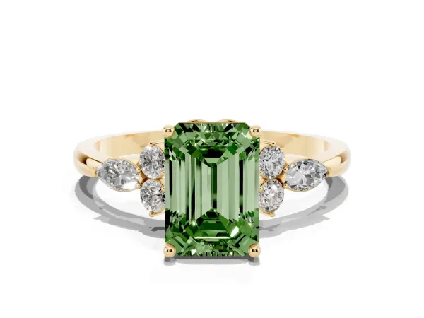 Fancy Green Emerald Cut Brilliant Diamond Solitaire Ring with Pear Side Stones and Four-Prong Setting Yellow gold