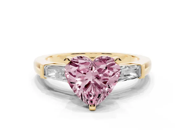 Fancy Pink Heart Cut Solitaire with Tapered Baguette Side Stones on a Classic Band with Four-Prong Setting Yellow gold
