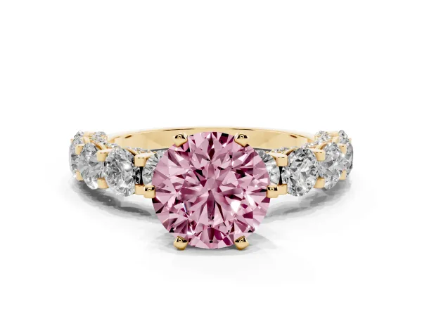 Fancy Pink Round Cut Diamond Side Stone Engagement Ring with Four-Prong Setting Yellow gold