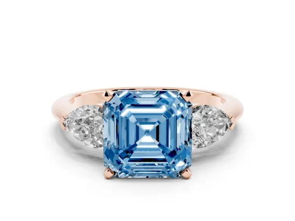 Fancy Blue Three-Stone Asscher Cut Diamond Ring with Pear Side Stones and Four-Prong Setting Rose gold