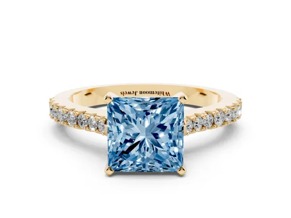 Fancy Blue Princess Cut Cut Solitaire Diamond Engagement Ring with Pave Band and Four-Prong Setting Yellow gold
