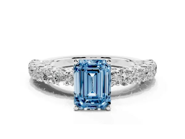 Fancy Blue Emerald Cut Diamond Solitaire Ring with Shared Prong Pavé Band and Four-Prong Setting Platinum