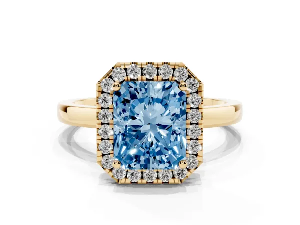 Fancy Blue Radiant Cut Halo Diamond Solitaire with Pavé Band and Four-Prong Setting Yellow gold