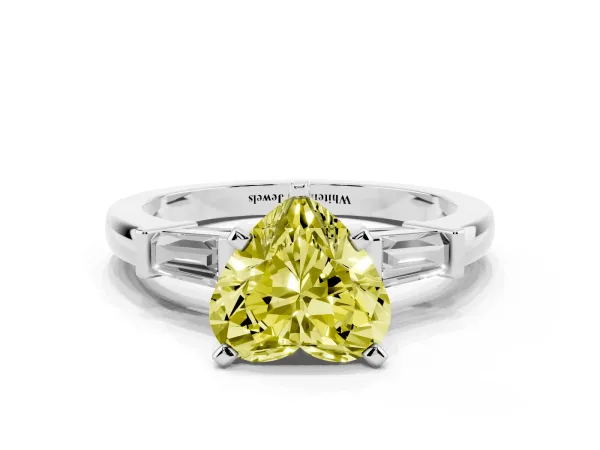 Fancy Yellow Heart Cut Cut Diamond Solitaire Ring with Tapered Baguette Accents and Four-Prong Setting Platinum