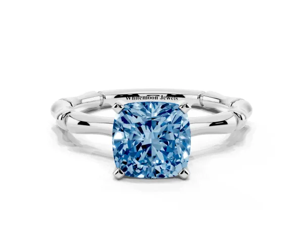 Fancy Blue Cushion Cut Solitaire Diamond Ring with Bamboo Band and Four-Prong Setting Platinum