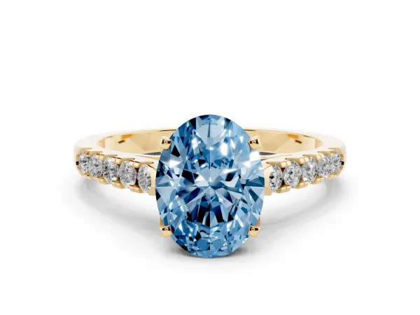 Fancy Blue Oval Cut Diamond Pavé Band Solitaire Ring with Prong Setting Yellow gold