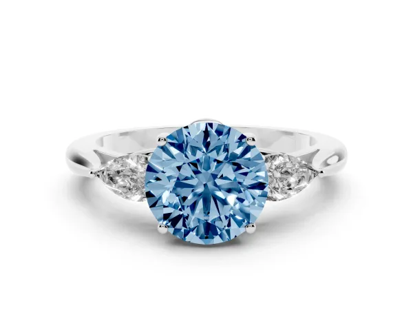 Fancy Blue Three-Stone Round Cut Brilliant Diamond Solitaire Ring with Tapered Band and Four-Prong Setting Platinum