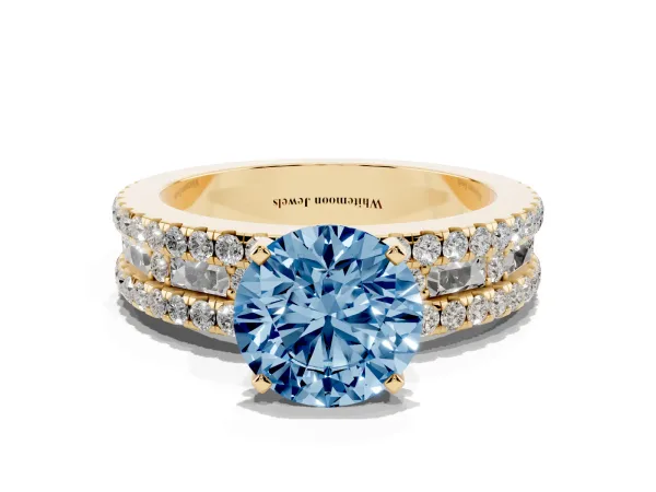 Fancy Blue Round Cut Diamond Solitaire Ring with Pavé and Channel Set Band Yellow gold