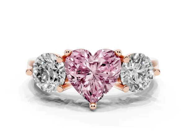 Fancy Pink Three-Stone Heart Cut Brilliant Cut Solitaire Ring with Prong Setting on a Classic Band Rose gold