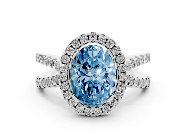 Fancy Blue Oval Cut Diamond Halo Ring with Split Shank Pavé Band and Prong Setting White gold