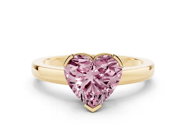 Fancy Pink Heart Cut Cut Solitaire Ring with Four-Prong Setting and Classic Band Yellow gold