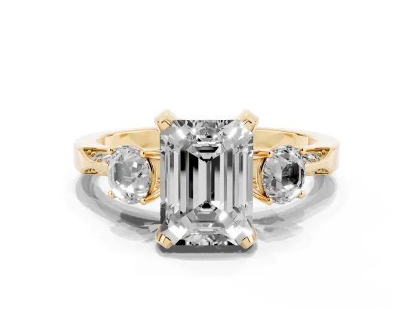 Emerald Cut Brilliant Three-Stone Diamond Ring with Pavé Band and Four-Prong Setting Yellow gold