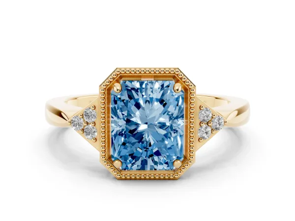Fancy Blue Radiant Cut Diamond Halo Ring with Tapered Band and Four-Prong Setting Yellow gold