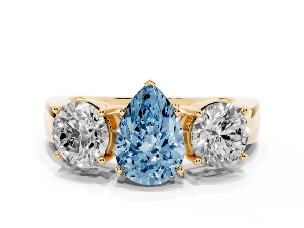 Fancy Blue Three-Stone Pear Cut Diamond Ring with Round Side Stones, Classic Band, and Four-Prong Setting Yellow gold