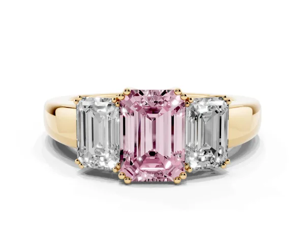 Fancy Pink Three-Stone Emerald Cut Cut Diamond Ring with Channel Set Band and Four-Prong Setting Yellow gold