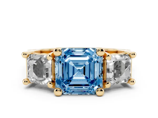 Fancy Blue Asscher Cut Diamond Three-Stone Ring with Channel Set Band and Four-Prong Setting Yellow gold