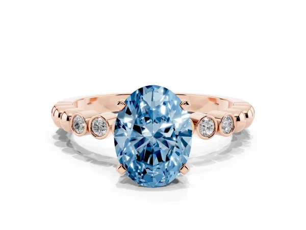 Fancy Blue Oval Cut Solitaire Bezel Accent Diamond Engagement Ring with Beaded Band and Four-Prong Setting Rose gold