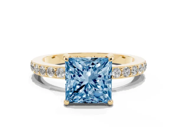 Fancy Blue Princess Cut Diamond Pavé Engagement Ring with Round Accents and Prong Setting Yellow gold