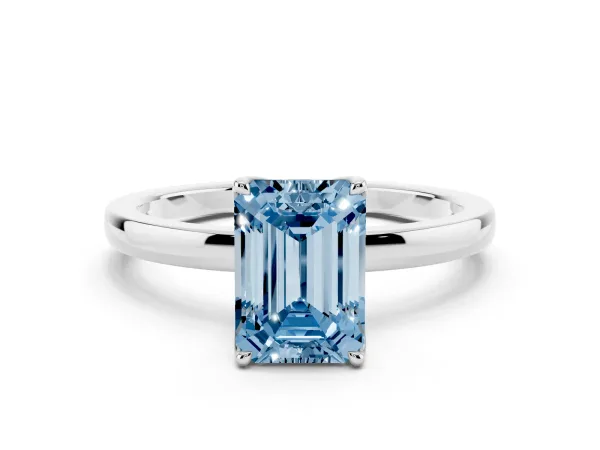 Fancy Blue Emerald Cut Diamond Solitaire Ring with Thin Band and Prong Setting Platinum