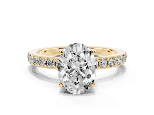 Oval Cut Cut Diamond Solitaire with Pave Band and Four-Prong Setting Yellow gold